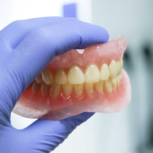 Próteses dentárias fixas